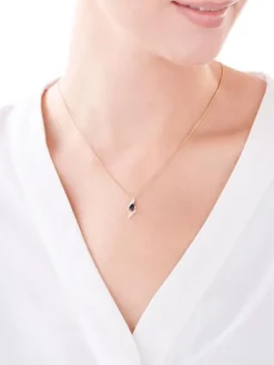 Zawieszka z żółtego złota z diamentami i szafirem - próba 585