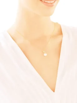 Zawieszka z żółtego złota z diamentami i perłą - próba 585