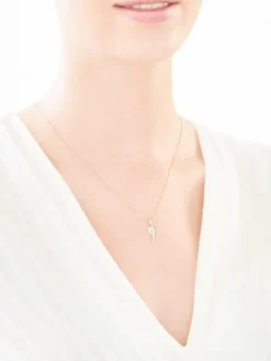 Zawieszka z żółtego złota z diamentami - medalik Matka Boska - 0,01 ct - próba 585