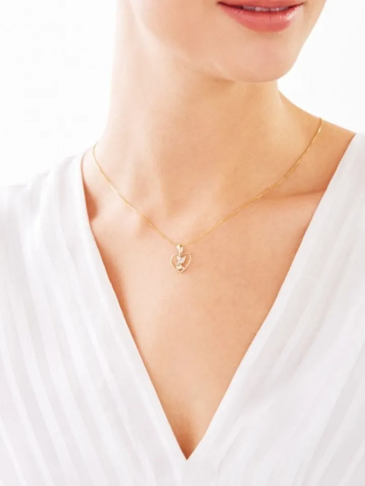 Zawieszka z żółtego złota z diamentem - aniołek, serce - 0,003 ct - próba 375