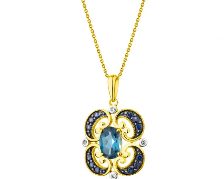 Zawieszka z żółtego złota z diamentami, szafirami i topazem London Blue - próba 585