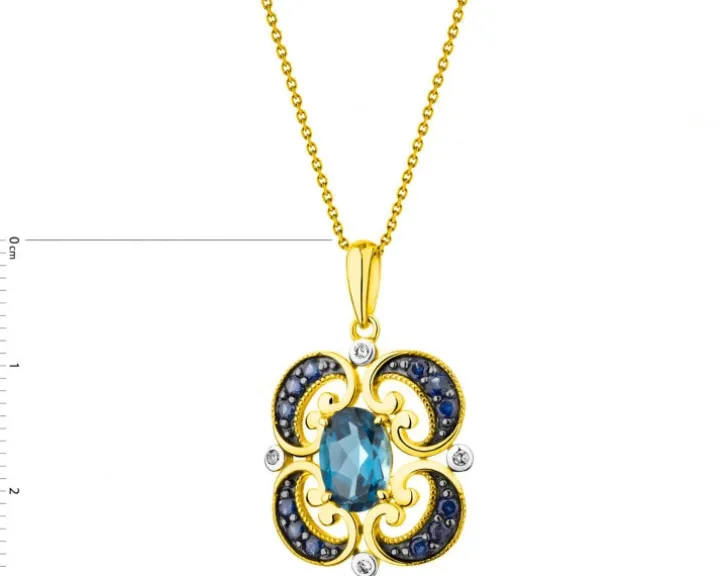 Zawieszka z żółtego złota z diamentami, szafirami i topazem London Blue - próba 585