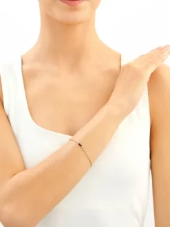 Złota bransoletka z cyrkonią