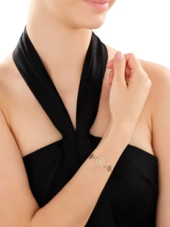 Złota bransoletka z cyrkoniami - rozety