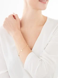 Złota bransoletka z emalią - koła