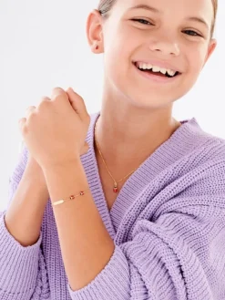 Złota bransoletka z emalią i blaszką - biedronki