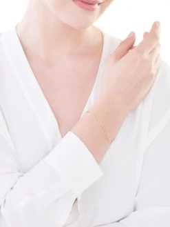 Złota bransoletka z kulkami, ankier - nieskończoność, skrzydło, serca