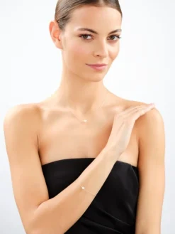 Złota bransoletka z perłą