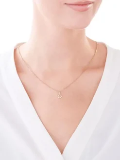 Złota zawieszka z emalią - koło