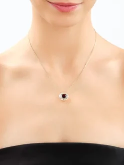 Złota zawieszka z granatem