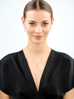 Złota zawieszka z kryształem syntetycznym