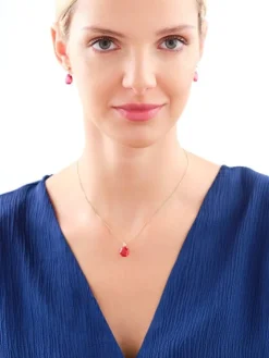 Złota zawieszka z kryształem syntetycznym