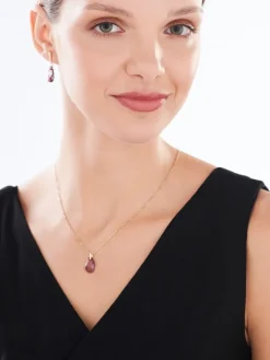 Złota zawieszka z kryształem syntetycznym