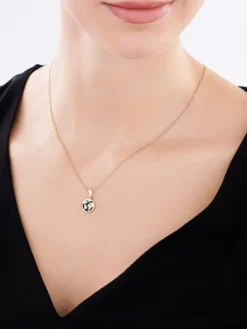 Złota zawieszka z onyksem syntetycznym - mapa świata