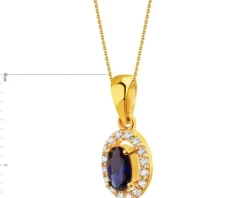 Złota zawieszka z szafirem syntetycznym i cyrkoniami