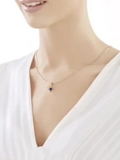 Złota zawieszka z szafirem syntetycznym i cyrkonią - serce