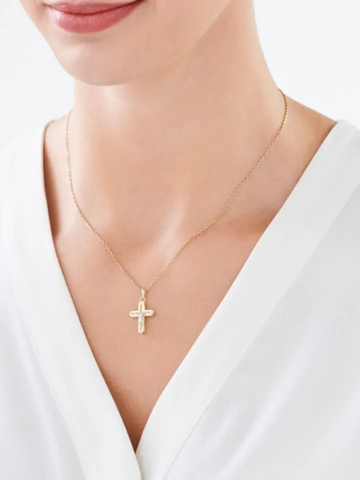 Złota zawieszka z wizerunkiem Chrystusa - krzyż