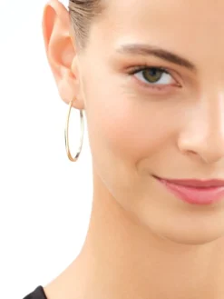 Złote kolczyki - koła