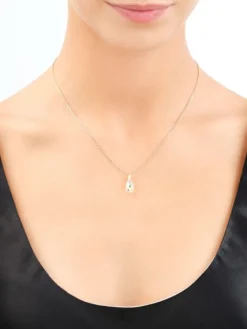 Złote kolczyki i zawieszka z kryształami syntetycznymi - komplet