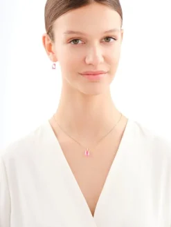 Złote kolczyki z kryształami syntetycznymi