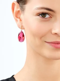 Złote kolczyki z kryształami syntetycznymi