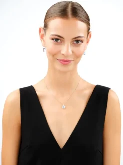 Złote kolczyki z kryształami syntetycznymi