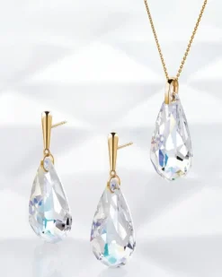 Złote kolczyki z kryształami syntetycznymi