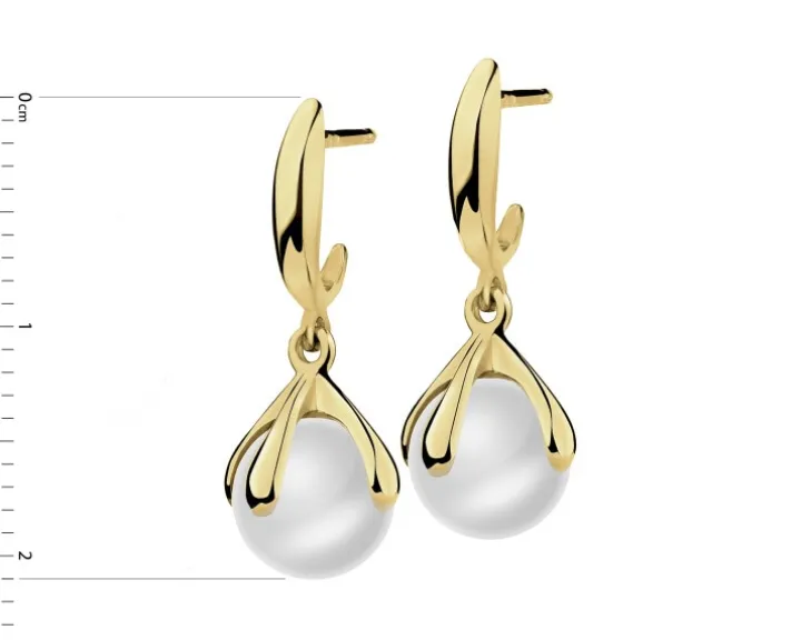 Złote kolczyki z perłami