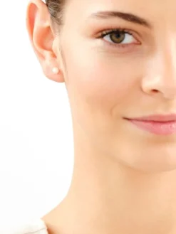 Złote kolczyki z perłami