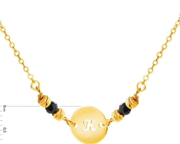Złoty naszyjnik z cyrkoniami, ankier - koło, litera K