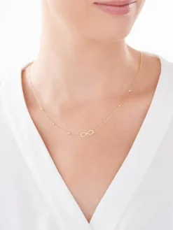 Złoty naszyjnik ze znakiem nieskończoności, ankier