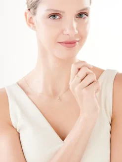 Złoty pierścionek z cyrkonią - kwiat lotosu