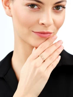 Złoty pierścionek z cyrkoniami - love