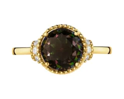 Złoty pierścionek z korundem syntetycznym i cyrkoniami