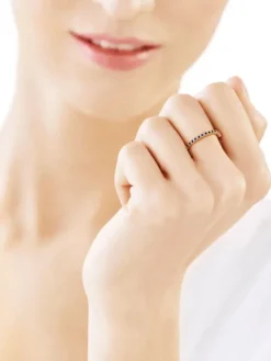 Złoty pierścionek z szafirami syntetycznymi